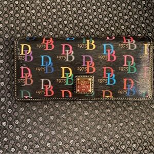 Leather Dooney & Bourke slim snap wallet 3.5” x 8”